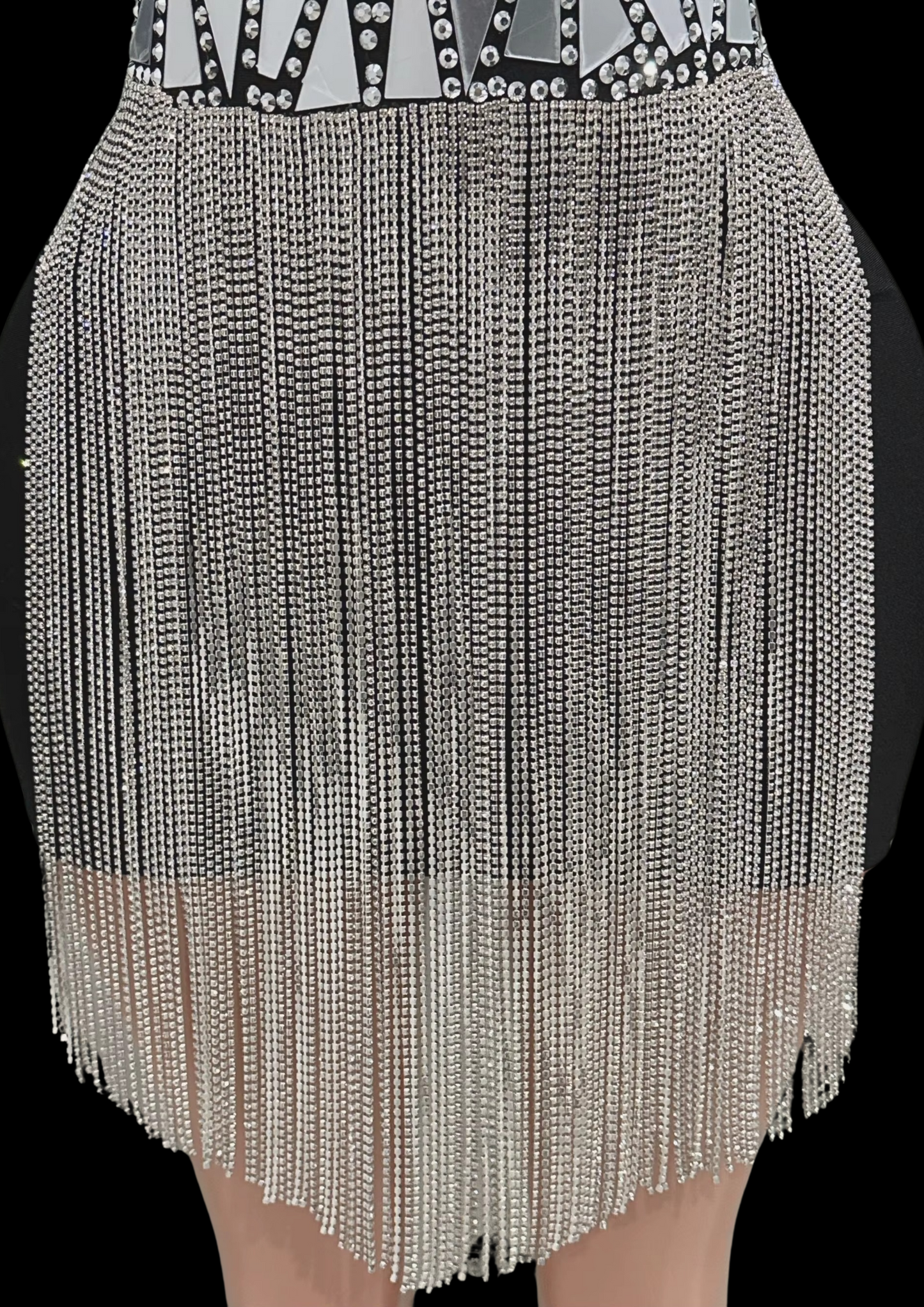 Mini dress with silver fringe detail and geometric beaded pattern.