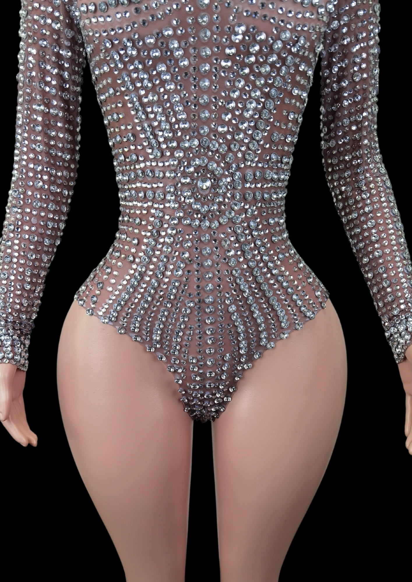 Silver embellished party romper with sheer fabric design.