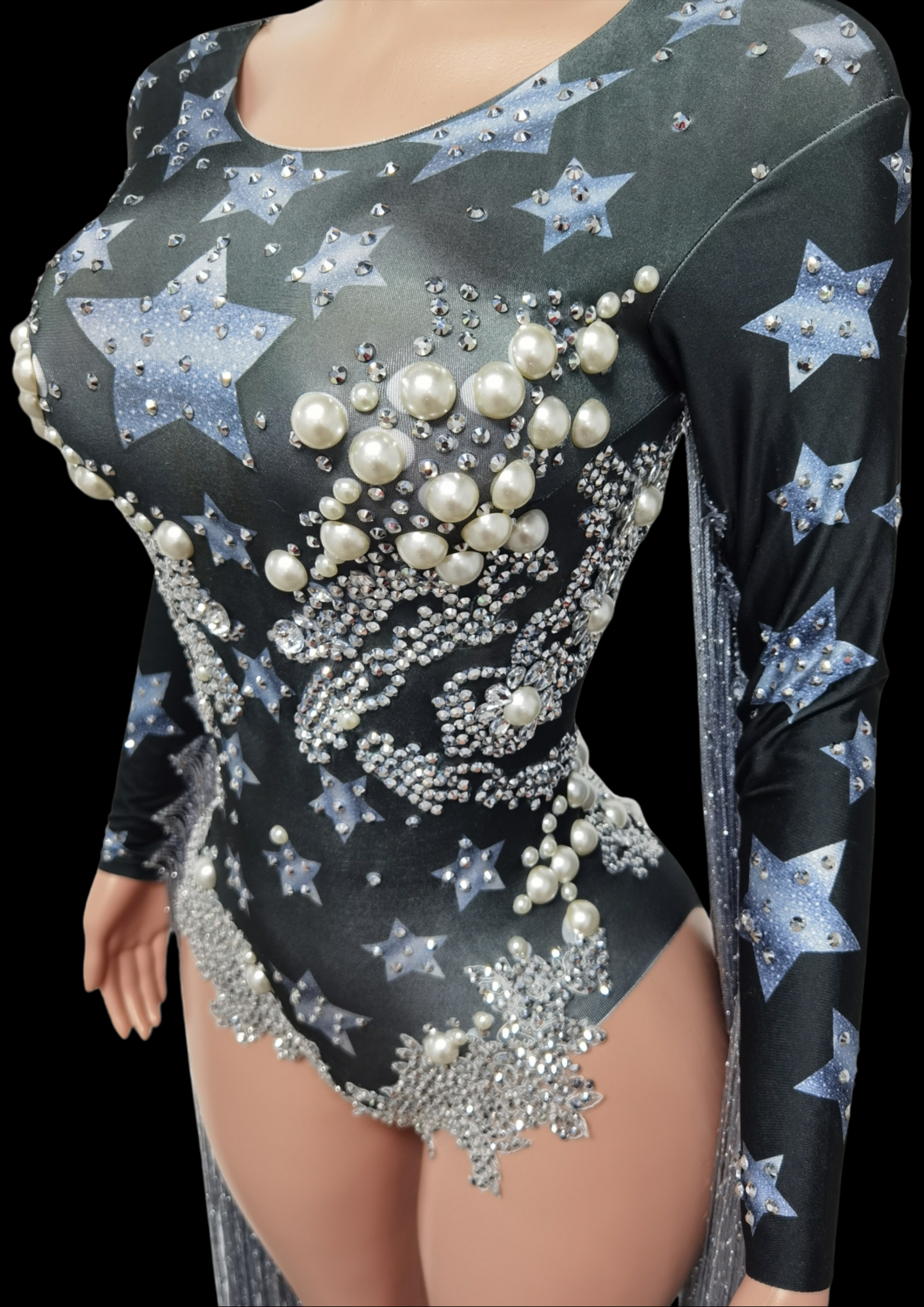Party Romper Claire with star and pearl embellishments, long sleeves, and intricate detailing.