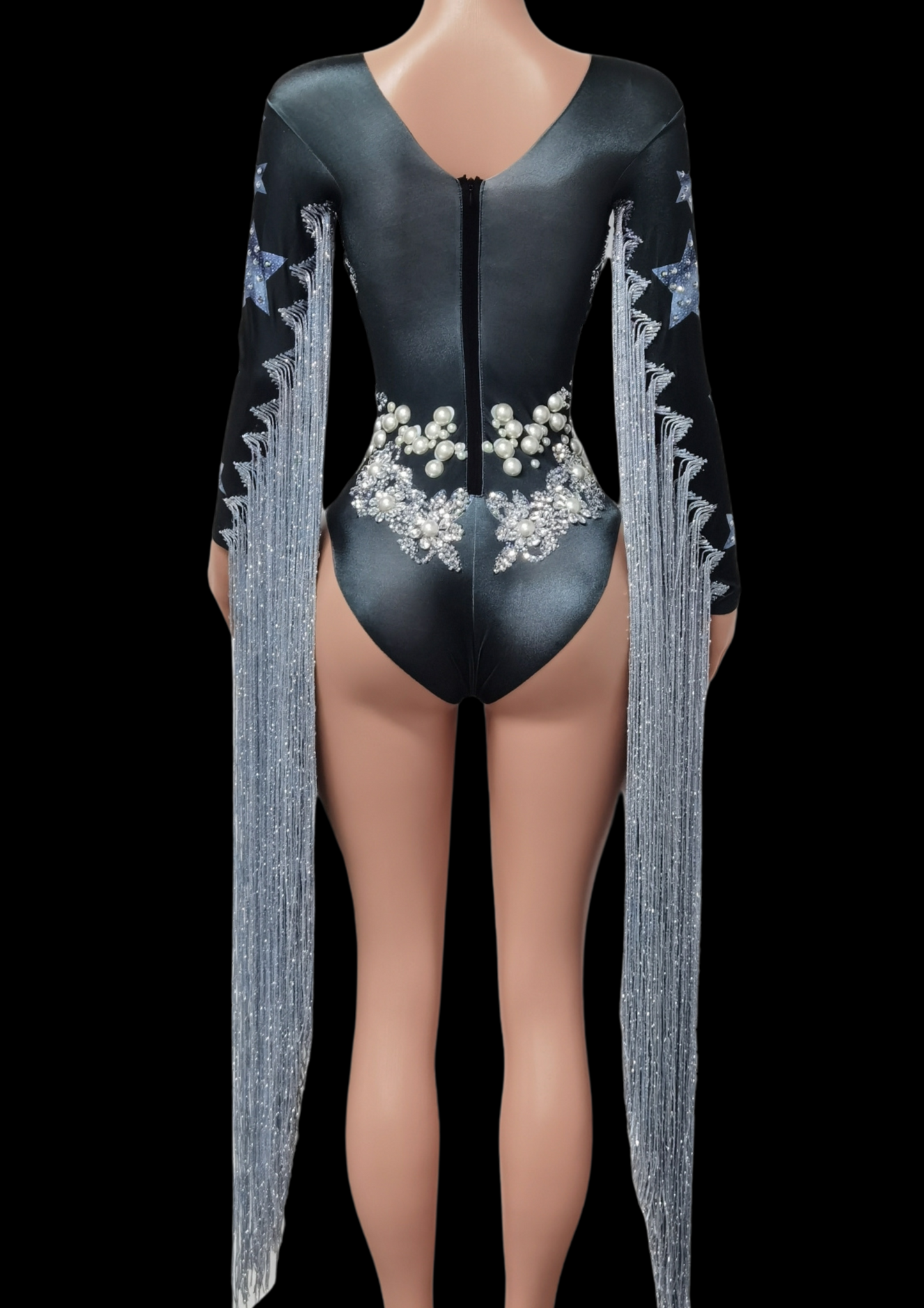 Party Romper Claire with elegant long sleeves and intricate detailing.