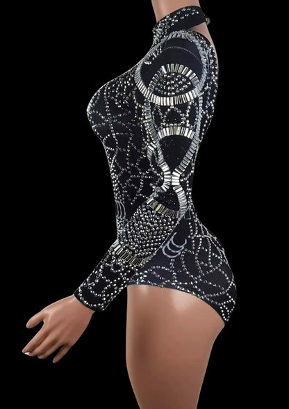Party Romper: Midnight Armor with intricate beadwork and long sleeves, side view on mannequin.