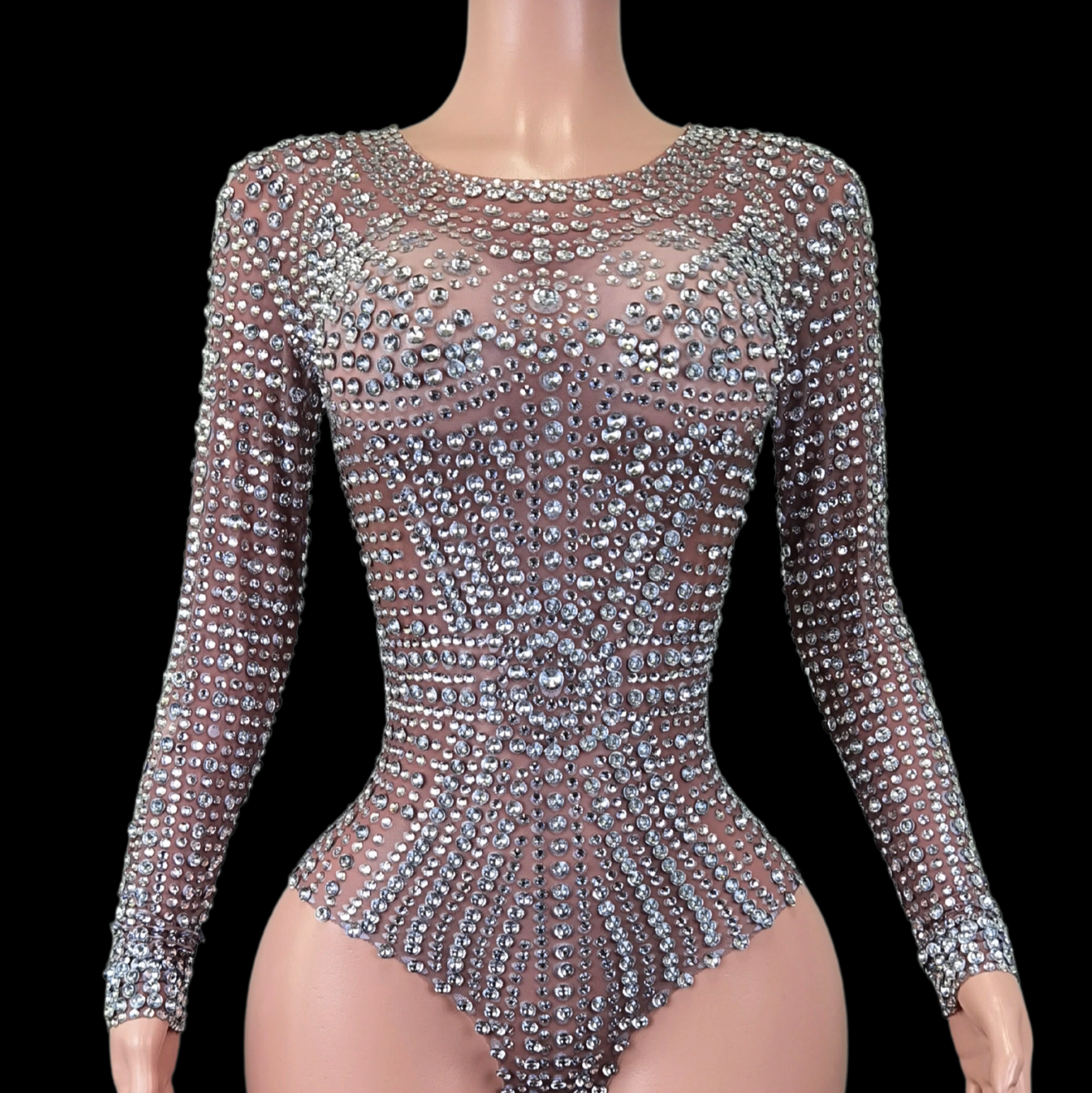 Stunning sequin party romper with long sleeves and intricate detailing for a radiant look.