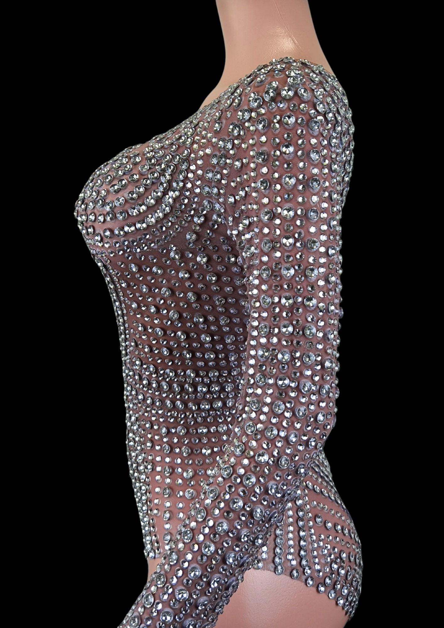 Party Romper: Radiant Spell with intricate embellishments.
