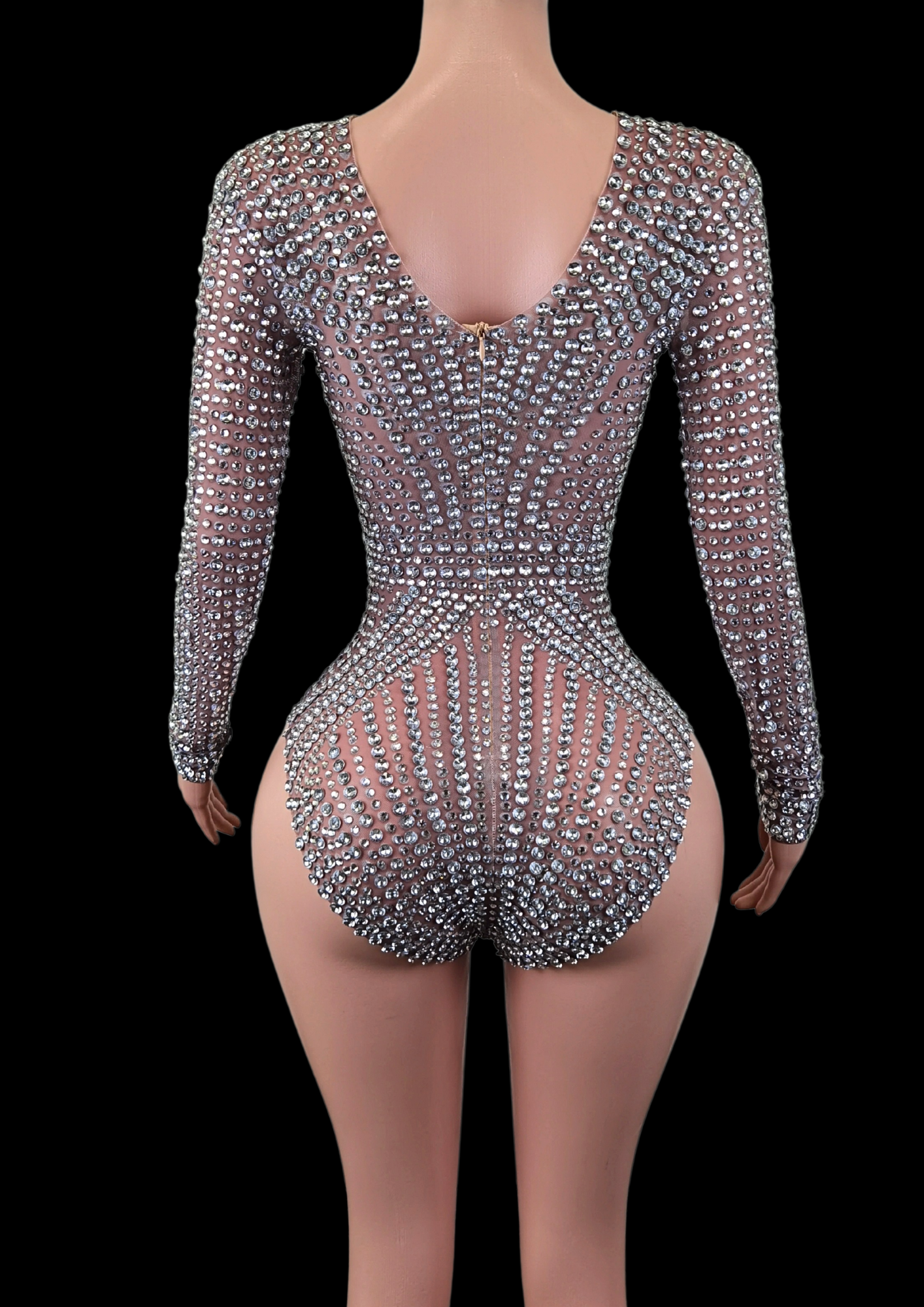 Party Romper: Radiant Spell with shimmering embellishments and a fitted design.