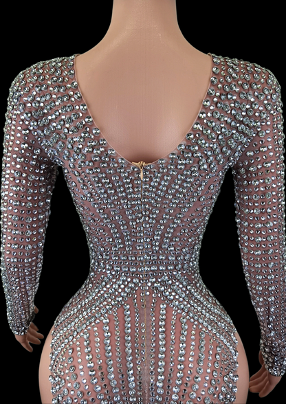Sparkling party romper with intricate rhinestone detailing.