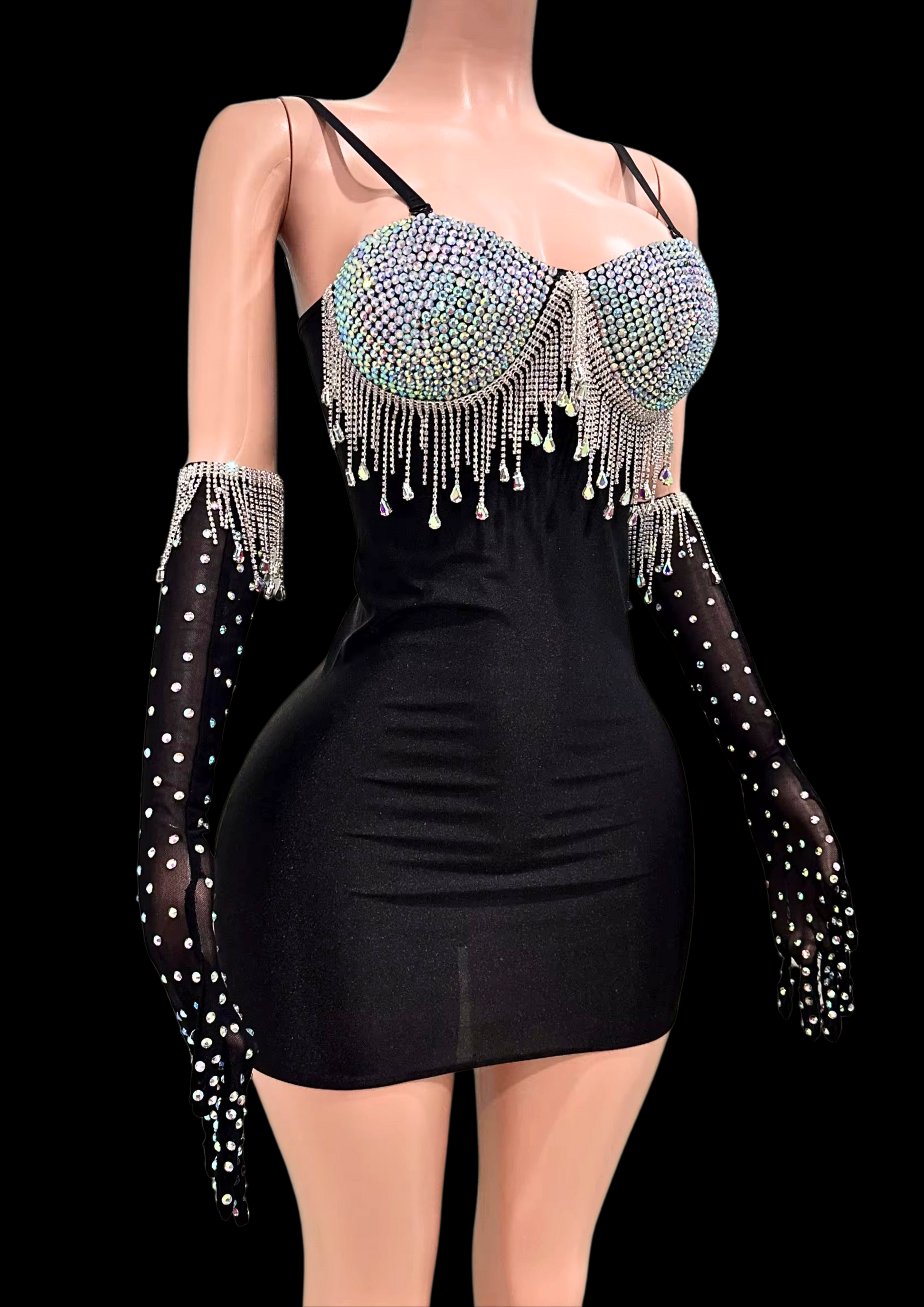 Mini dress with crystal embellishments on mannequin.