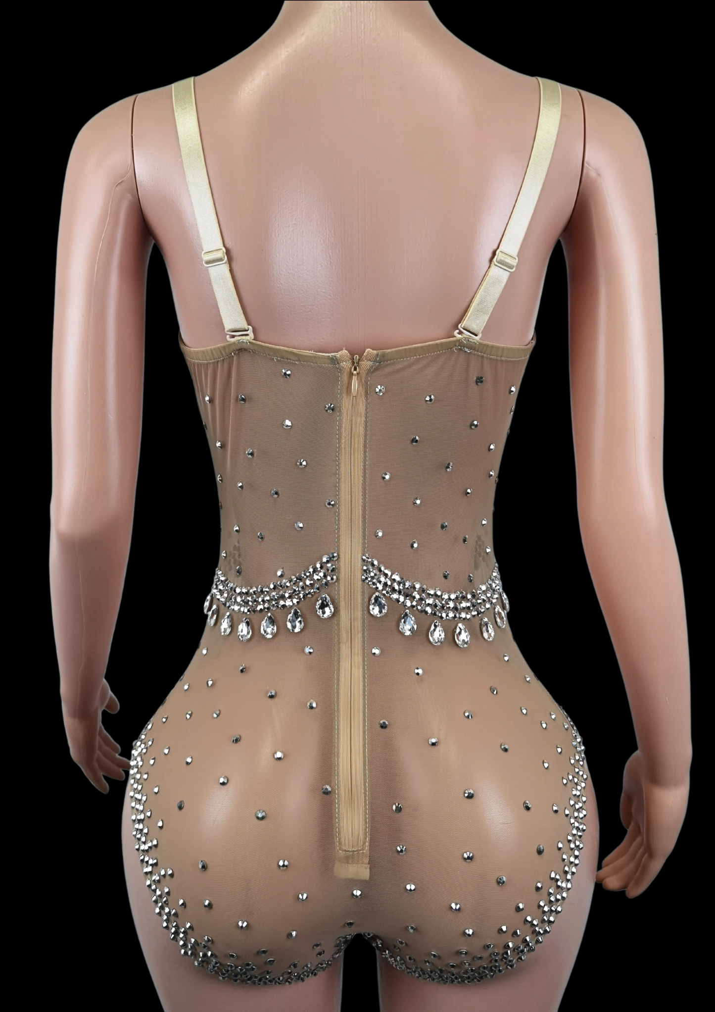 Elegant party romper with sparkling embellishments on sheer fabric, back view.