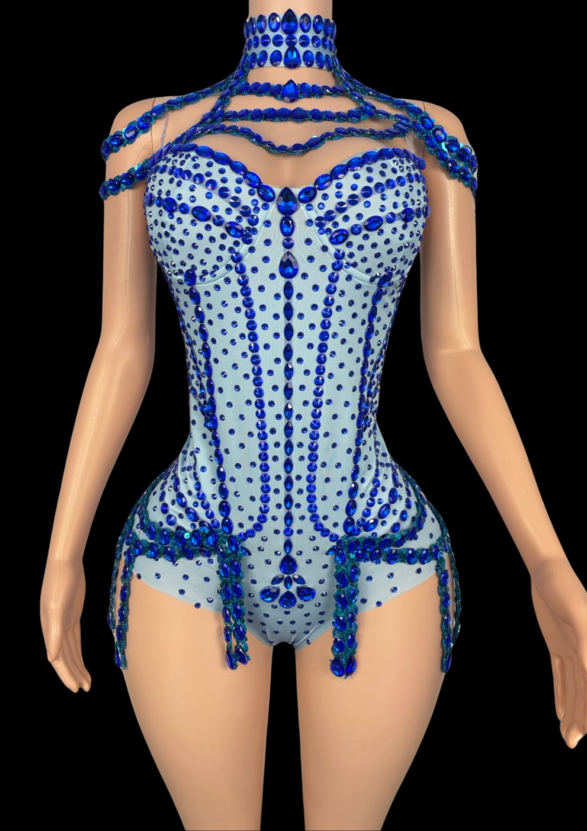 Blue embellished party romper with intricate design, inspired by Sabrina Carpenter, on mannequin.