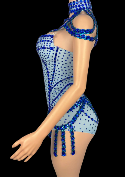 Party Romper inspired by Sabrina Carpenter with blue embellishments on a mannequin.