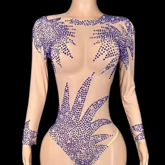 Party Romper: Starburst Dream, adorned with shimmering blue embellishments on a sheer nude fabric.