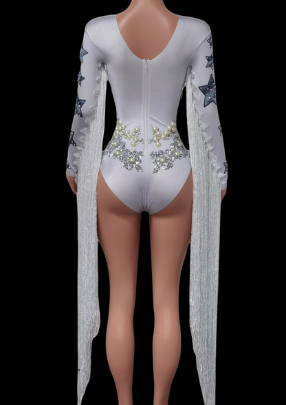Party Romper Chloe with star embellishments and fringe detail, rear view on mannequin.