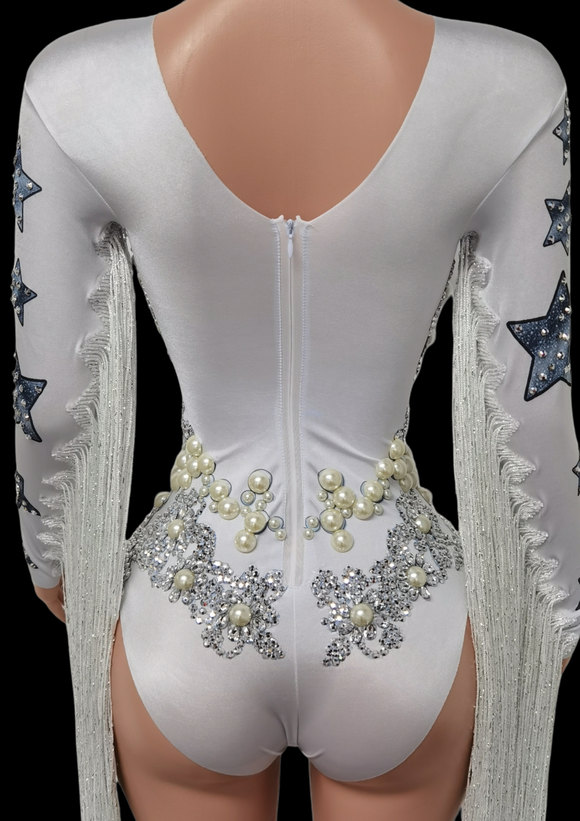 Party Romper Chloe with pearl and star embellishments on back, white color, long sleeves, fringe detail.