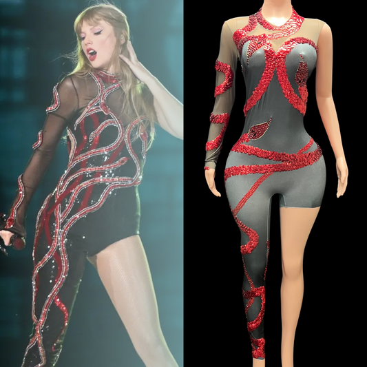 Stylish dark enigma party jumpsuit inspired by a famous singer, featuring intricate red designs on sheer black fabric.
