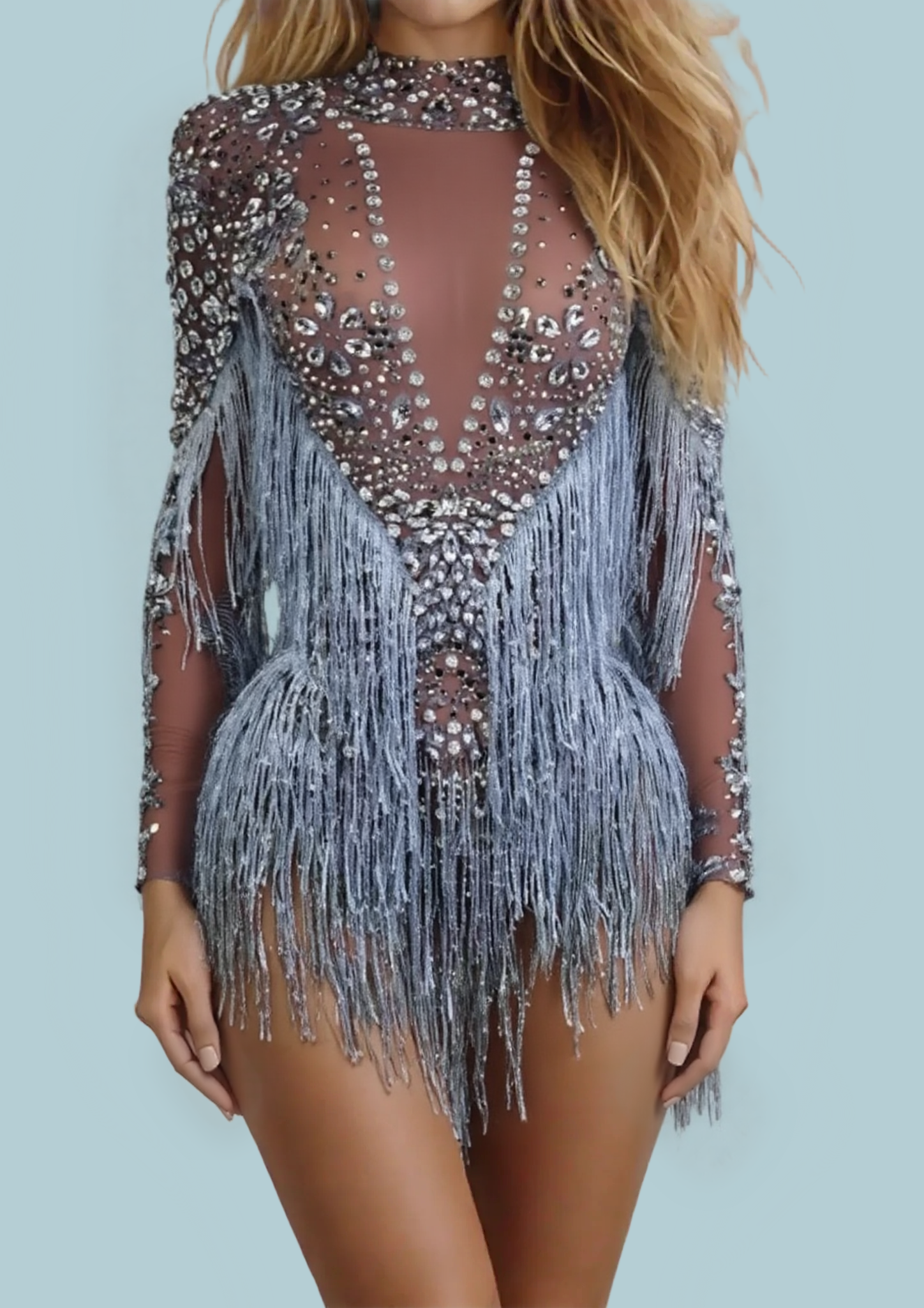 Dreamy Dancer party romper with fringe and sequin details.