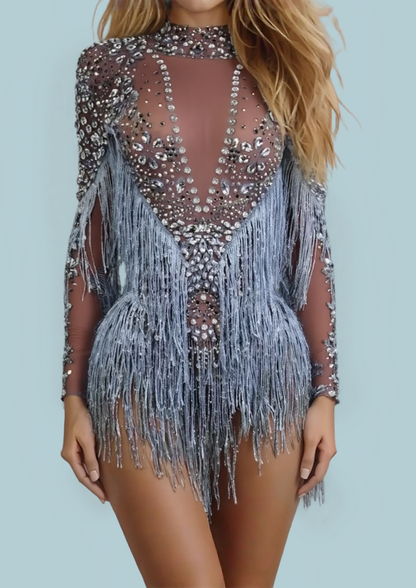 Dreamy Dancer party romper with fringe and sequin details.